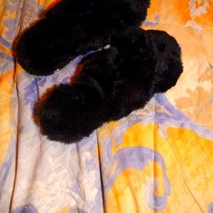 Size 11/ 12 black flurry slippers